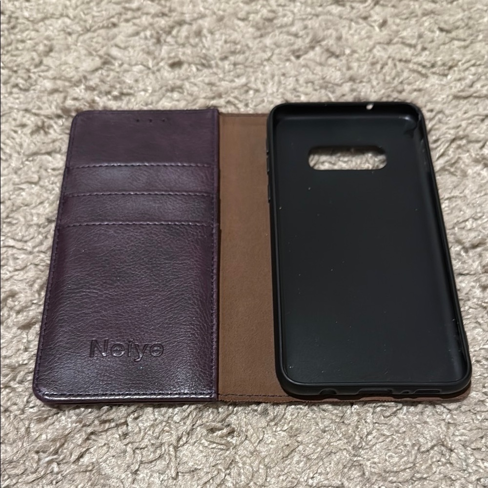 Stylish Black and Purple Phone Case with Bifold Design